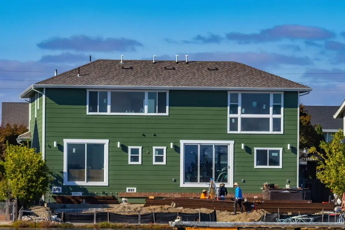 Craften crew working on the exterior of a home